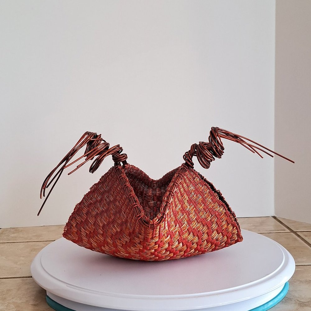 Copper wire art basket.